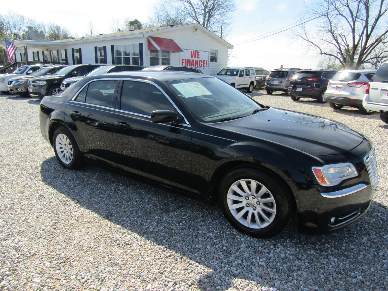 2013 Black /Tan Chrysler 300 RWD (2C3CCAAG5DH) with an 3.6L V6 SOHC 24V engine, Automatic transmission, located at 15016 S Hwy 231, Midland City, AL, 36350, (334) 983-3001, 31.306210, -85.495277 - Photo #0